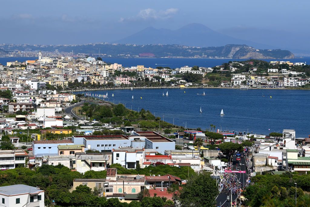 NAPOLI ITALY MAY 14 A general view of the Peloton passing through Bacoli during the 105th Giro dItalia 2022 Stage 8 a 153km stage from Napoli to Napoli Giro WorldTour on May 14 2022 in Napoli Italy Photo by Tim de WaeleGetty Images