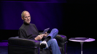 Steve Jobs with iPad on Chair