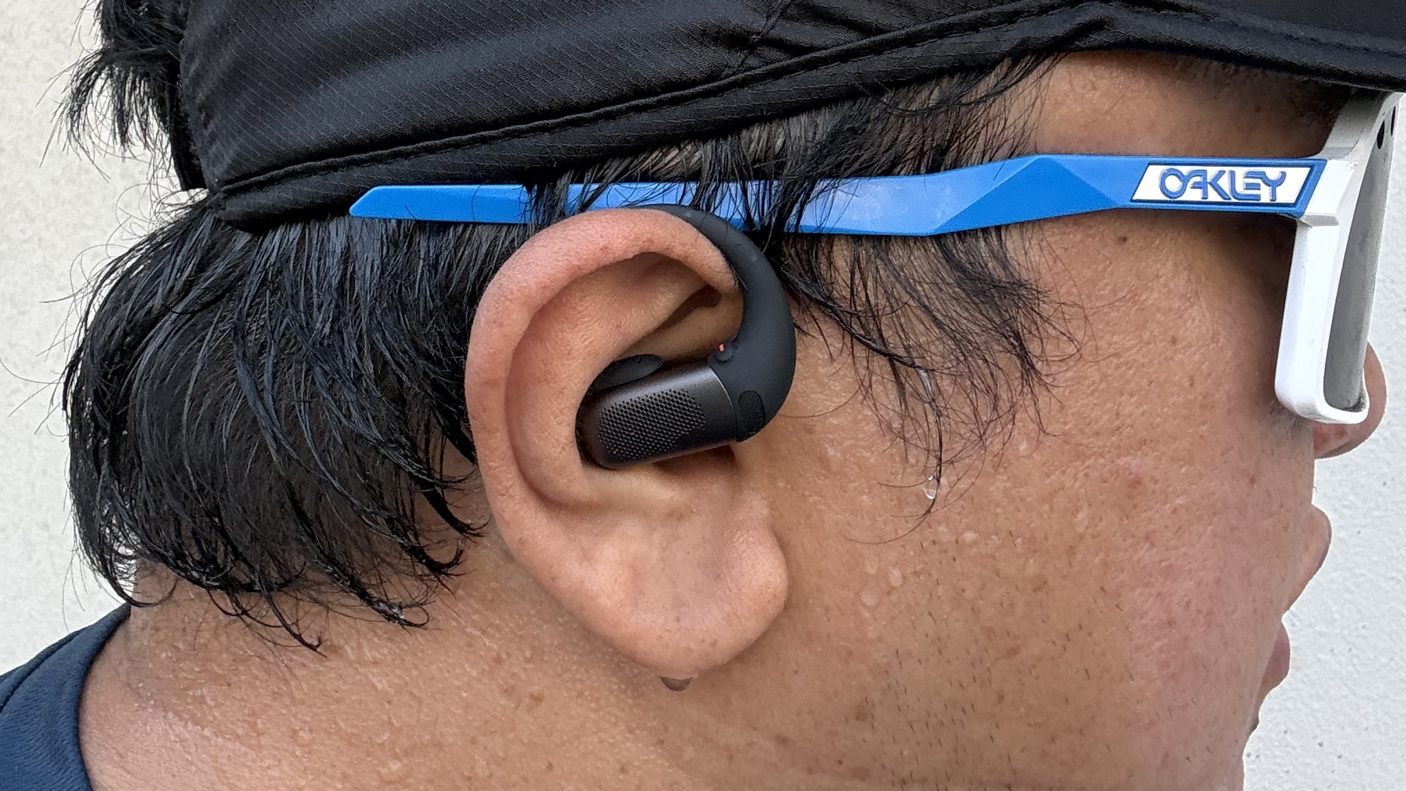 Article author Nico Arboleda wearing the Shokz OpenFit Pro