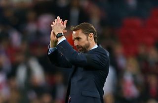 Gareth Southgate applauds the England fans after the final whistle