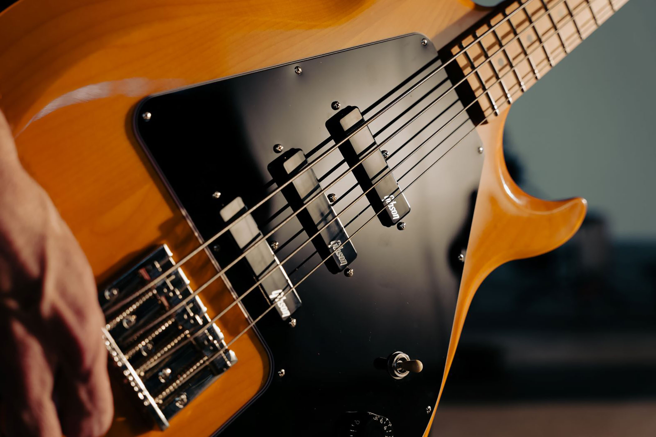 The Epiphone Mike Dirnt G-3 Grabber is an affordable replica of his original Gibson and features a trio of Gibson USA pickups, custom wiring, and is available in Natural and Silverburst finishes.