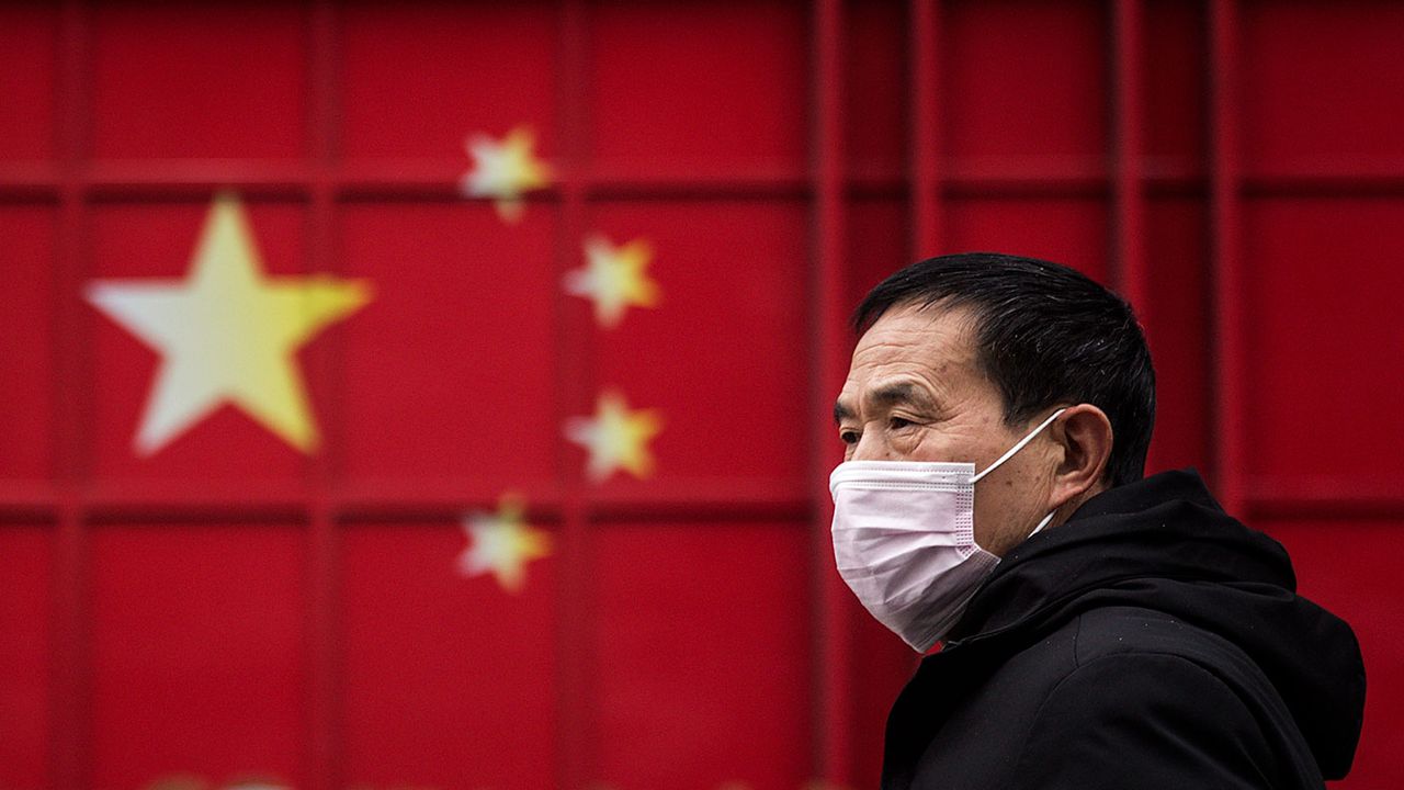 Chinese man with a Covid mask