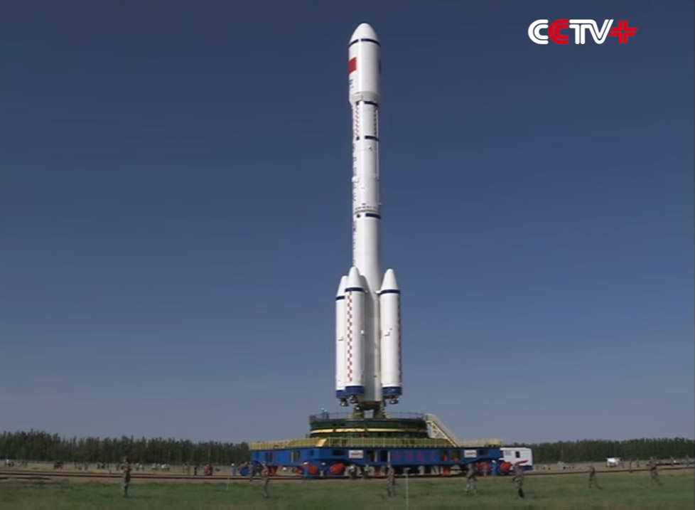 This still image from a state-run CCTV newscast shows the Long March 2F rocket carrying China&#039;s Tiangong-2 space lab rolling out to the launch pad for a mid-September 2016 launch. 