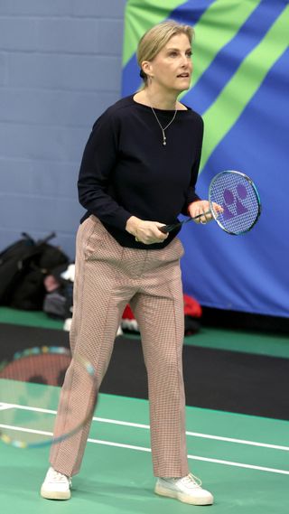 Sophie, Duchess of Edinburgh plays badminton during her visit to the All England Open Badminton Championships in 2024