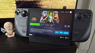 Antank 6-in-1- Steam Deck dock with handheld connected next to Gollum figure.