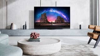 Panasonic JZ2000 in a home, sitting on marble bench with minimalist decoration around it