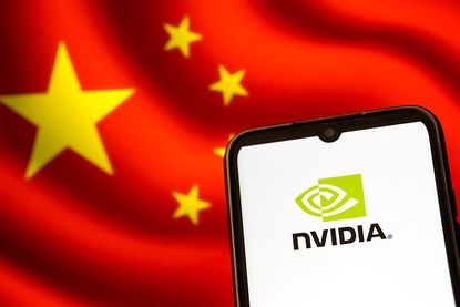Nvidia logo on a smartphone screen, flag of China in the background on a laptop screen