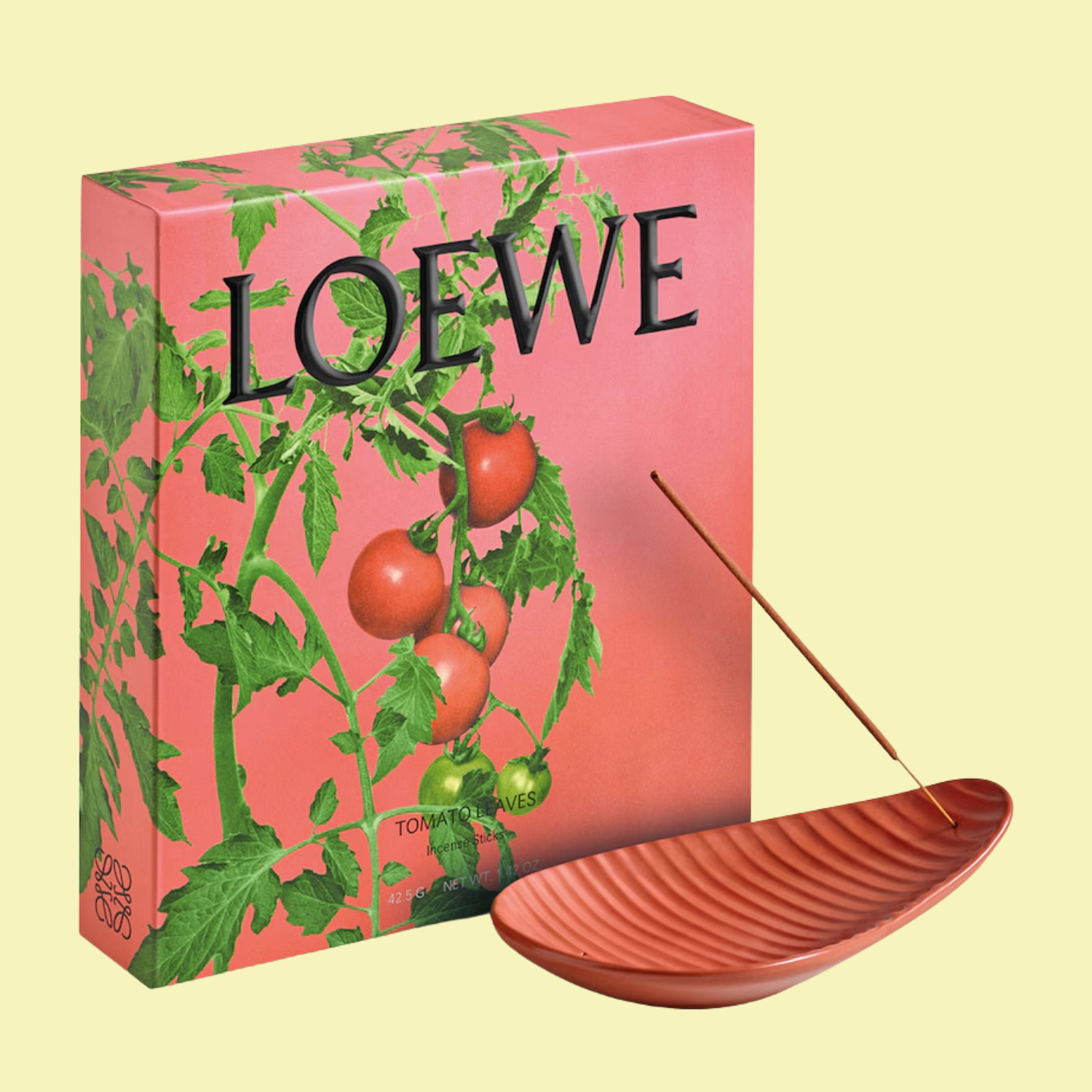 A box of incense with an incense holder