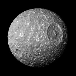 Saturn's moon Mimas is dominated by a huge, unmistakable crater called Herschel that makes the moon look like the Death Star in the movie "Star Wars." On Feb. 13, 2010, NASA's Cassini spacecraft made closest-ever flyby of Mimas, returning this photo an