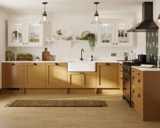 Yellow country kitchen with butler sink Howdens