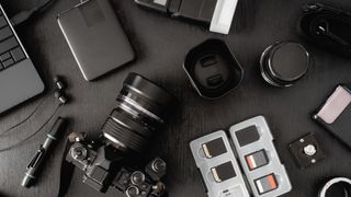 camera accessories on a black table