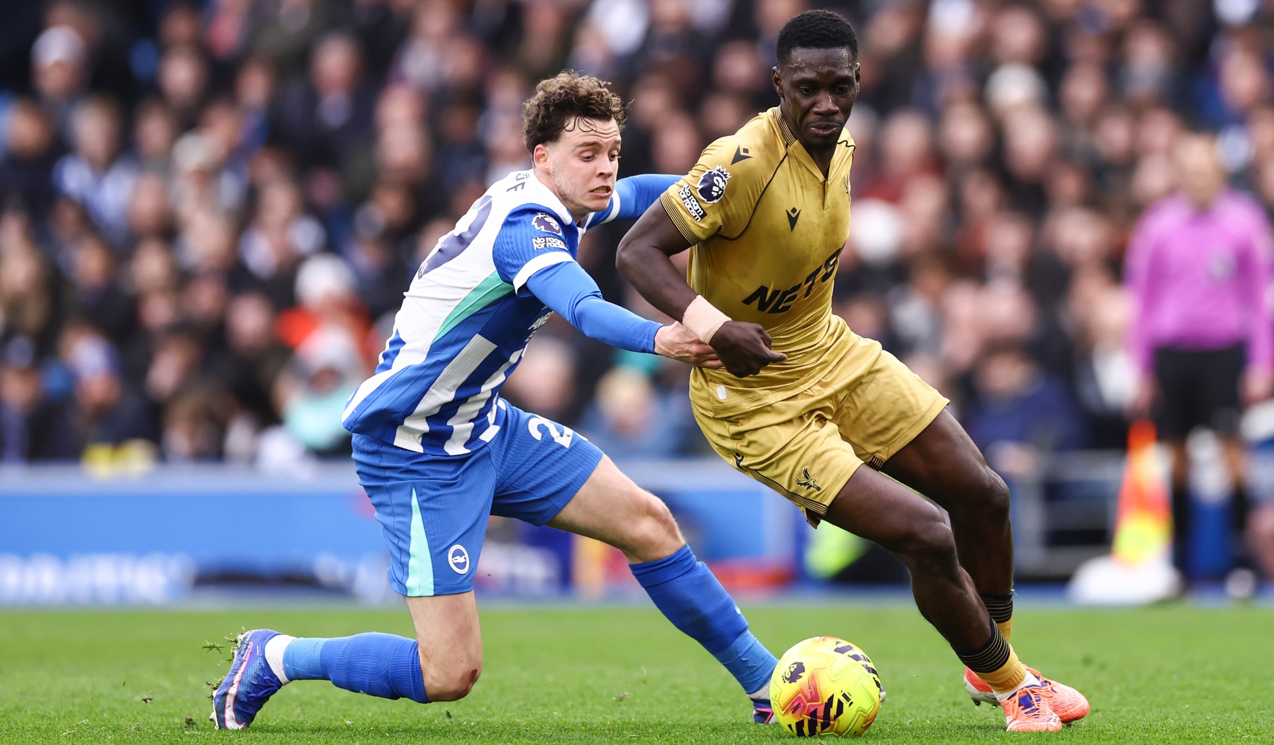 Ismaila Sarr of Crystal Palace and Maxim de Cuyper of Brighton &amp; Hove Albion during the Premier League match between Brighton and Palace at Amex Stadium on February 8, 2026 in Brighton, United Kingdom