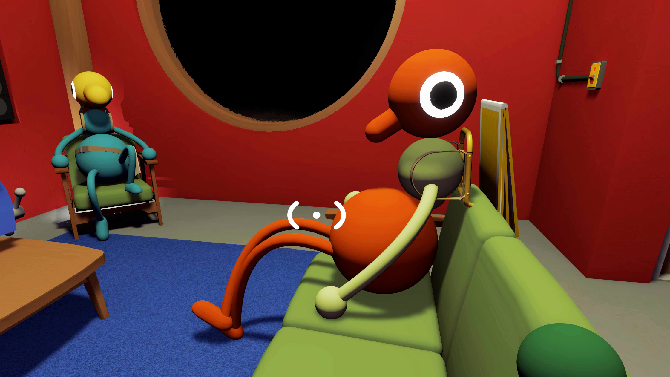 Two players sitting on a couch and a chair