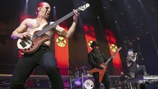 Ryan Martinie and singer Chad Gray of Mudvayne perform at PNC Music Pavilion on July 24, 2022 in Charlotte, North Carolina.