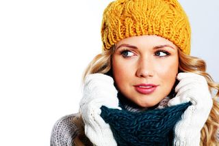 A woman wearing a warm winter hat