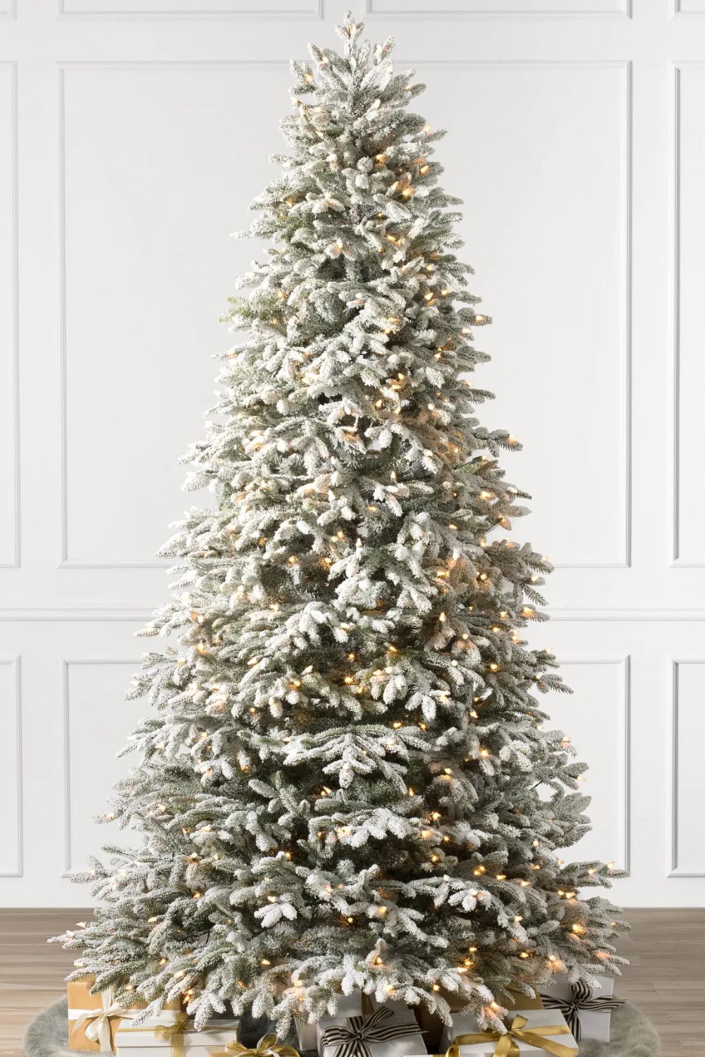 Frosted artificial Christmas tree with lights