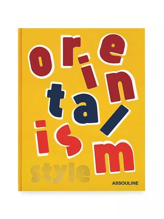 A yellow-background book with red, blue, and orange letters reading 