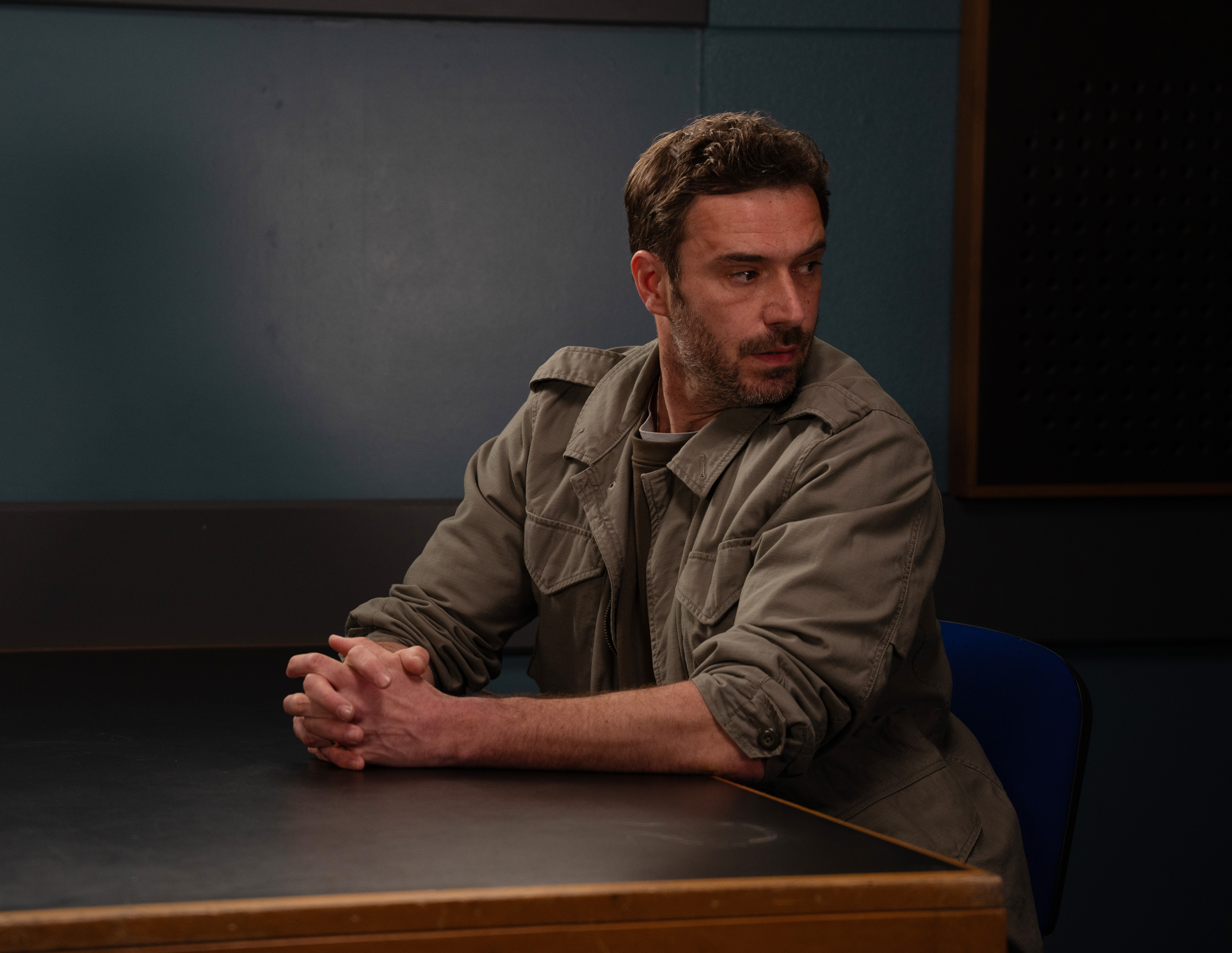 John in the police station