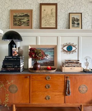 Wallpapered room with credenza