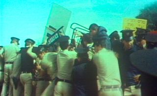 Photograph at an outdoor riot or protest