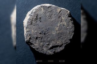 The ancient game board was scratched into a circular stone that was found above buried layers in the building that have been dated to the 7th and 8th Centuries.
