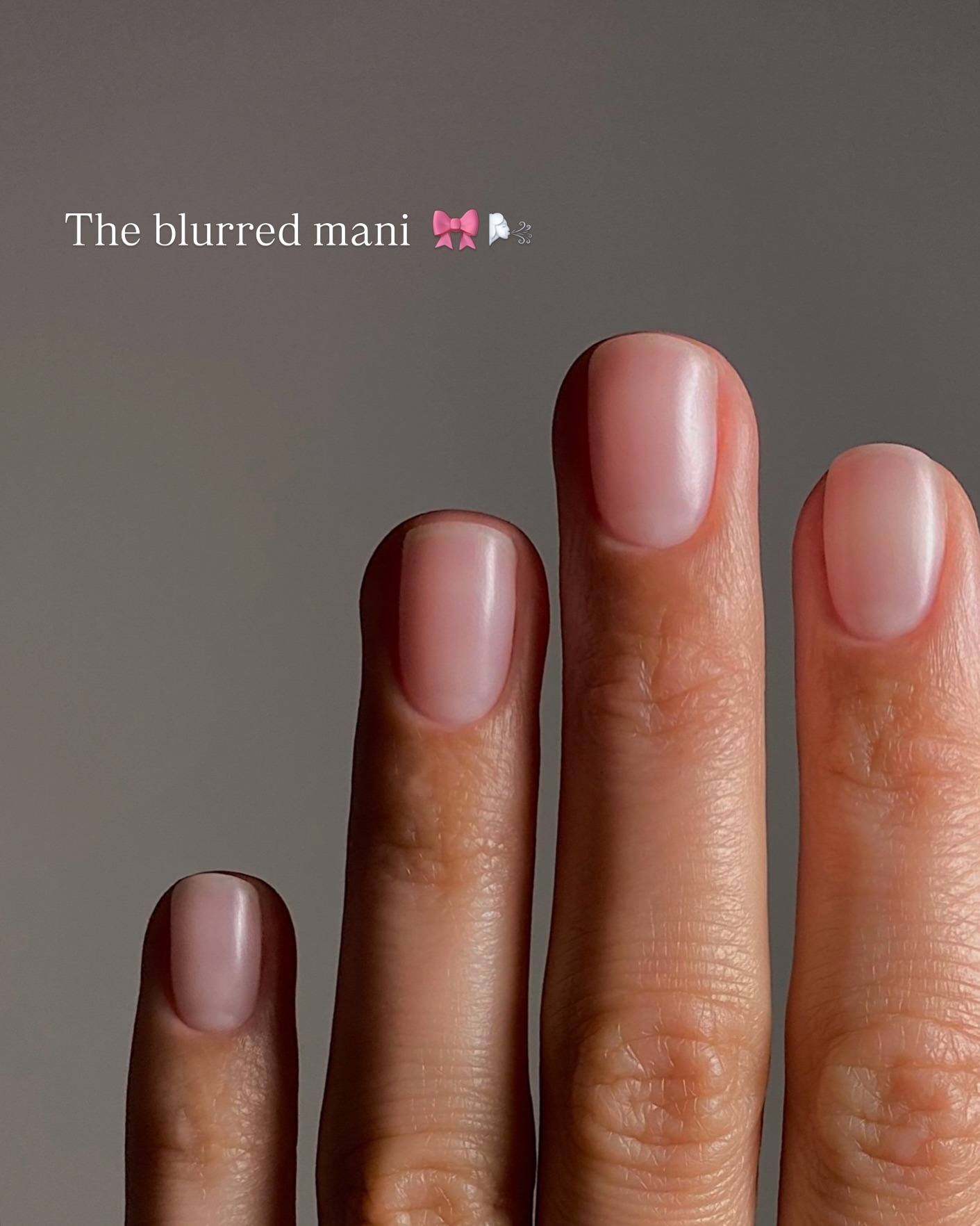 A close-up picture of a blurred manicure
