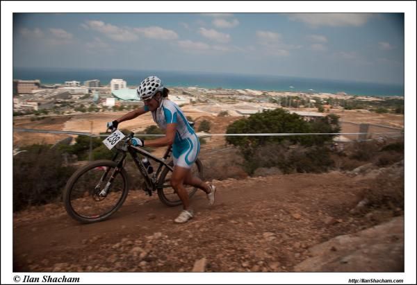 Daniela Veronesi (San Marino) runs her bike.