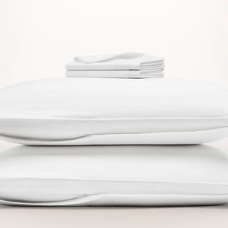 Complete Pillow Bundle against a cream bundle.