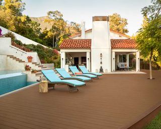 trex decking with pool house and steps