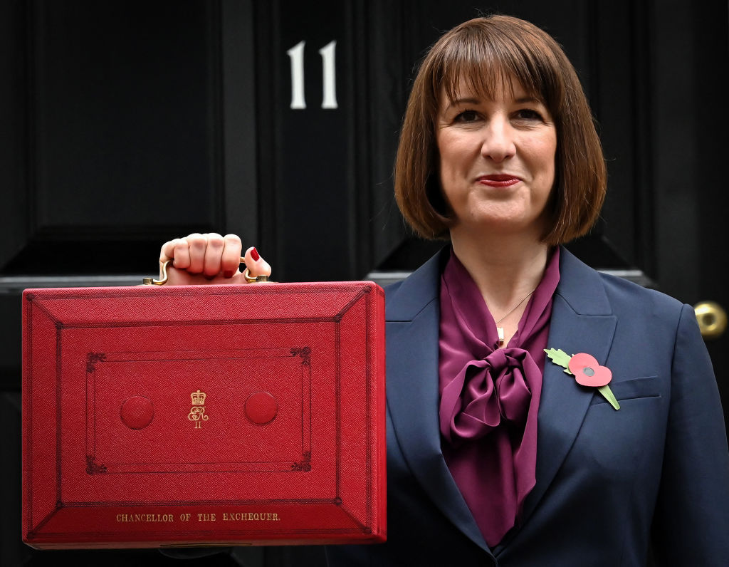 Britain's Chancellor of the Exchequer Rachel Reeves poses with the red Budget Box as she leaves 11 Downing Street, in central London, on October 30, 2024, to present the government's annual Autumn budget to Parliament