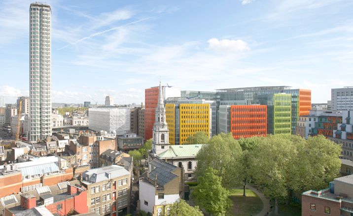 Complex of buildings with yellow, orange and green exterior