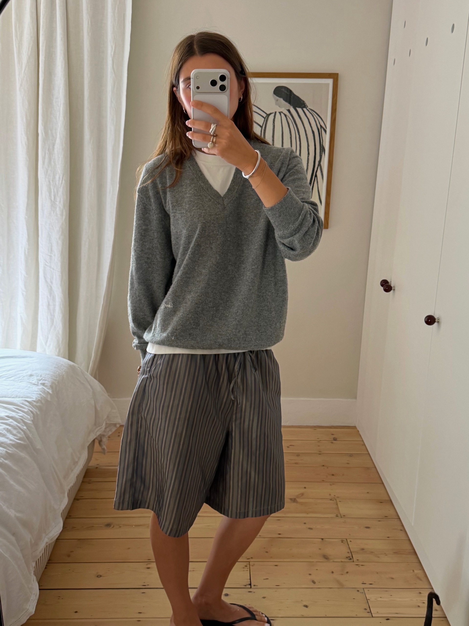 A woman wearing a fall sweater outfit in 2026.