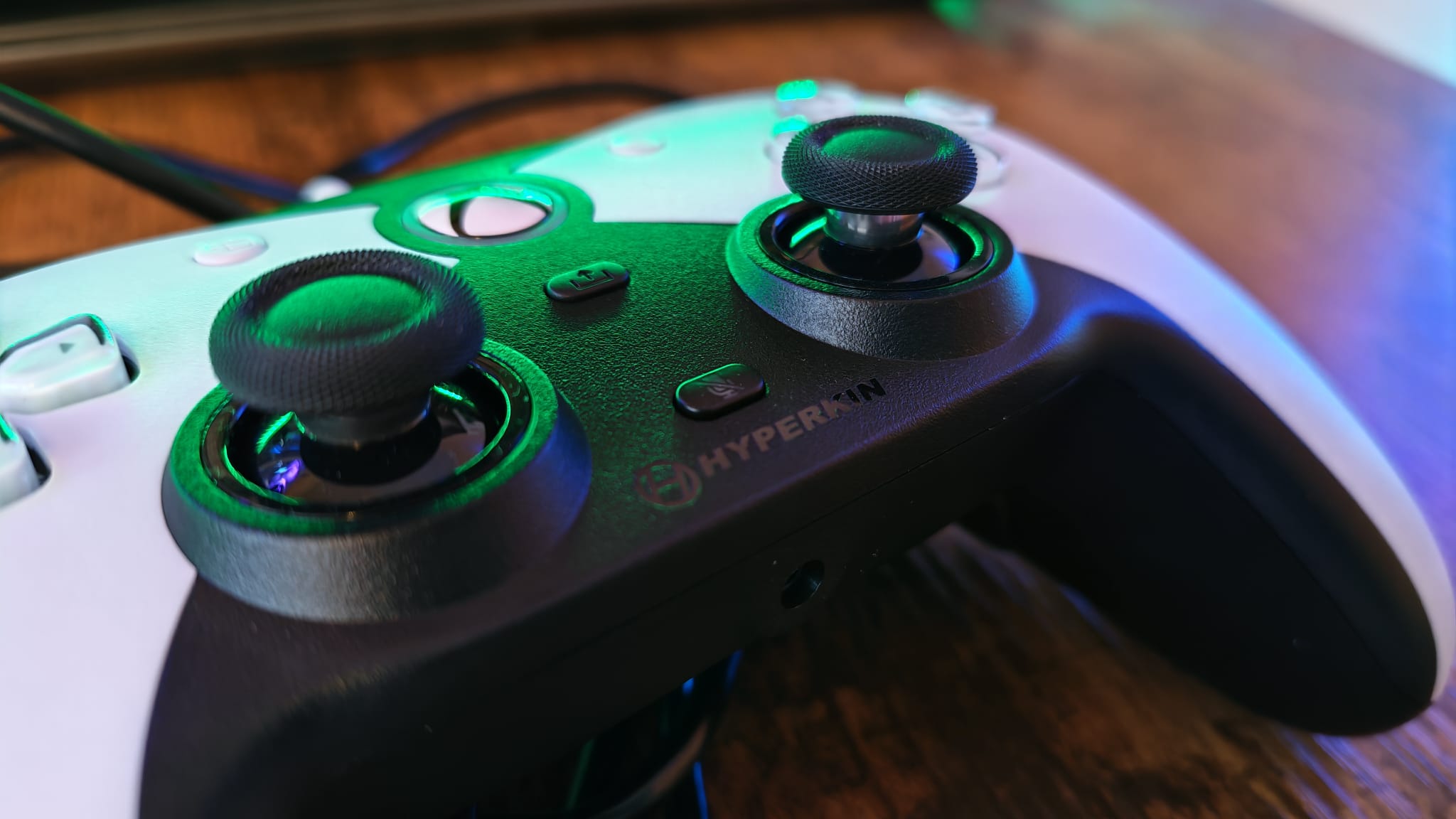 The branding on the face of the Hyperkin Competitor controller