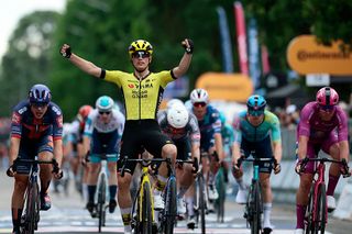 Team Visma-Lease a Bike's Dutch rider Olav Kooij celebrates after victory as he crosses the finish of the 12th stage of the 108th Giro d'Italia cycling race 172kms from Modena to Viadana on May 22, 2025. (Photo by Luca Bettini / AFP)