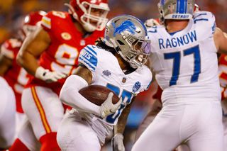 Jahmyr Gibbs #26 of the Detroit Lions runs with the football during the fourth quarter against the Kansas City Chiefs at GEHA Field at Arrowhead Stadium on September 7, 2023