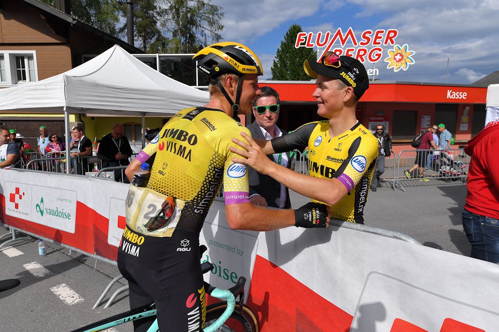 Raco van der Horn congratulates teammate Antwan Tolhoek on his stage 6 win at Tour de Suisse