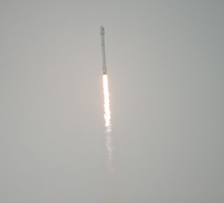 A SpaceX Falcon 9 rocket soars into space carrying the Jason-3 ocean-mapping satellite during a launch from Vandenberg Air Force Base in California on Jan. 17, 2016.
