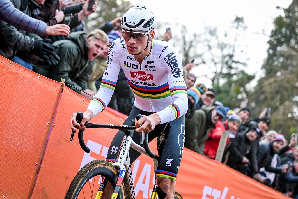 Dutch Mathieu Van Der Poel pictured in action during the men's elite race of the Cyclocross World Cup, in Namur, Sunday 14 December 2025, stage 4 (out of 12) in the World Cup of the 2026-2027 season. BELGA PHOTO DAVID PINTENS (Photo by DAVID PINTENS / BELGA MAG / Belga via AFP)