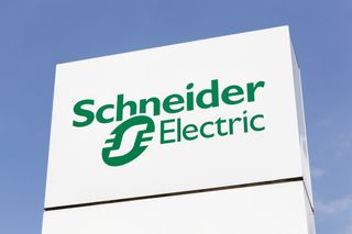 Schneider Electric sign with a blue sky in the background