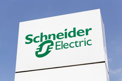Schneider Electric sign with a blue sky in the background