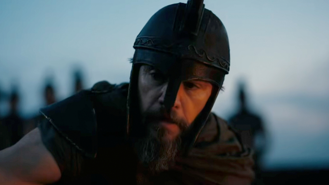 Brad Pitt in a warrior helmet in The Odyssey