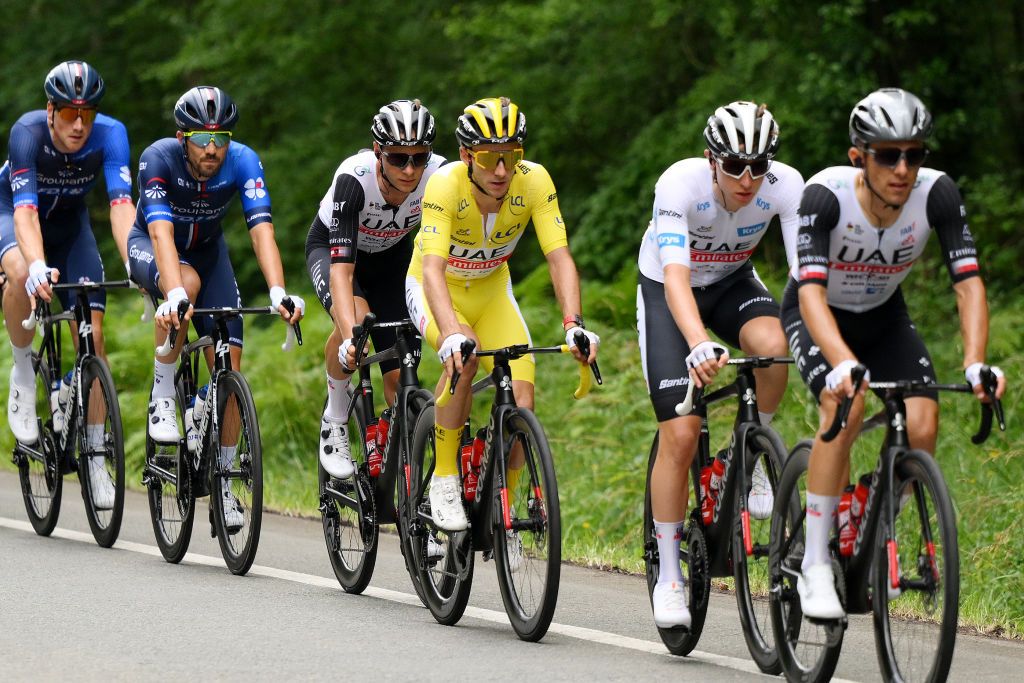 SAN SBASTIN SPAIN JULY 02 LR Adam Yates of United Kingdom and UAE Team Emirates Yellow Leader Jersey and Tadej Pogacar of Slovenia and UAE Team Emirates White Best Young Rider Jersey compete during the stage two of the 110th Tour de France 2023 a 2089km stage from VitoriaGasteiz to San Sbastin UCIWT on July 02 2023 in San Sbastin Spain Photo by David RamosGetty Images