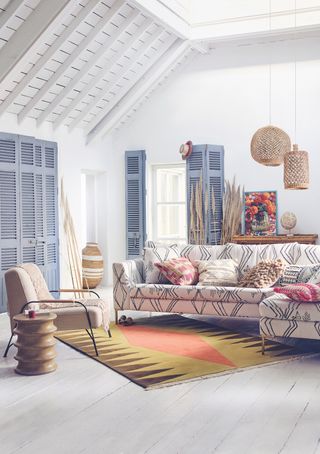 living room with patterned sectional sofa