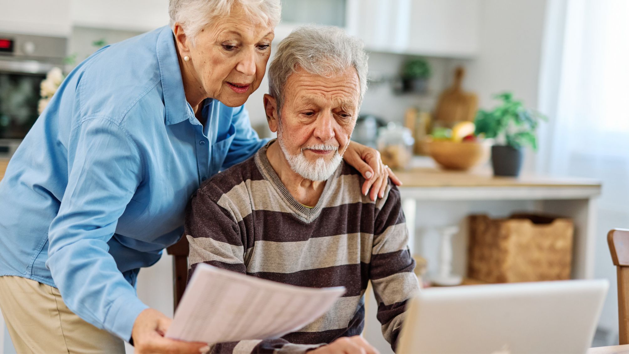 A couple discussing their finances at home