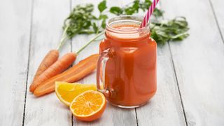 Healthy smoothie recipe featuring carrots and oranges