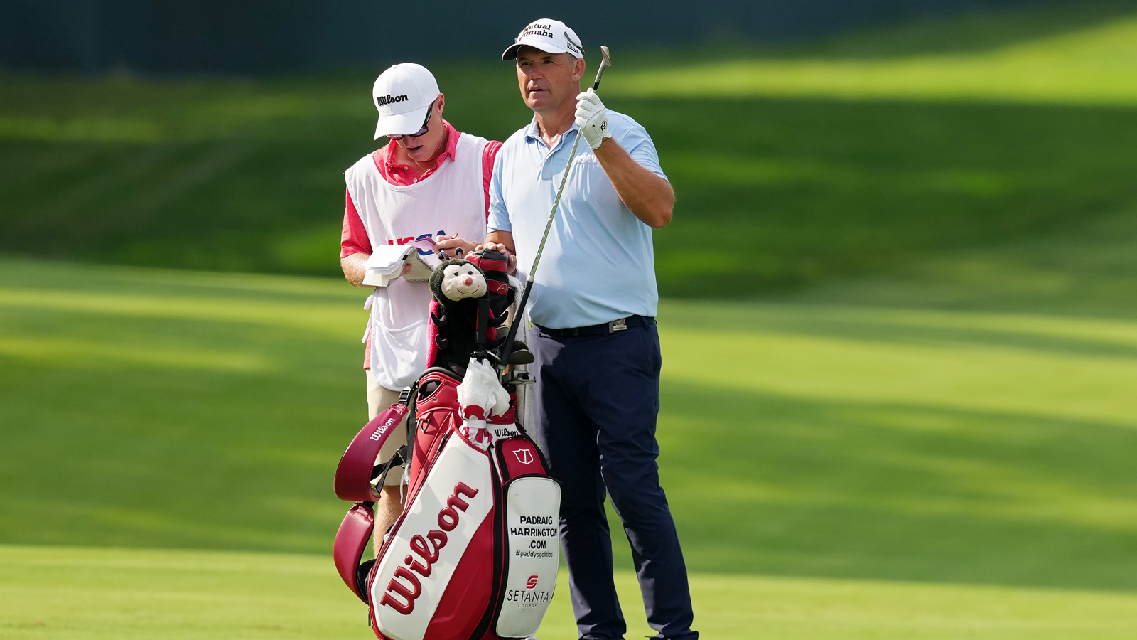 Padraig Harrington pulls a club out the bag