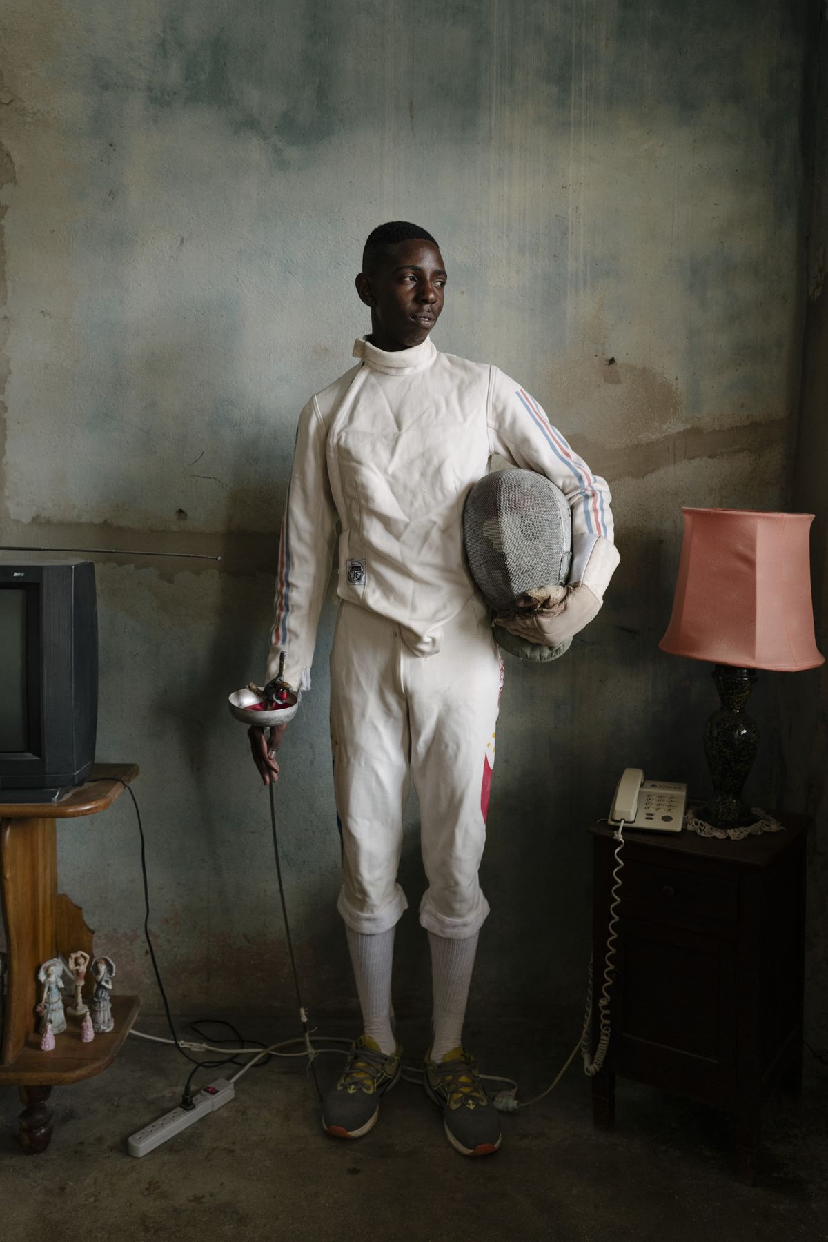 Neisser Yoel G&aacute;lvez Tabares (16) poses for a portrait at his family home in, Pinar del R&iacute;o, Cuba, 2025.
