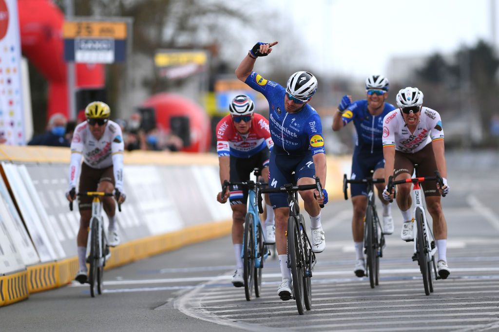 HARELBEKE BELGIUM MARCH 26 Arrival Mathieu Van Der Poel of Netherlands and Team AlpecinFenix Florian Senechal of France and Team Deceuninck QuickStep Celebration Oliver Naesen of Belgium and AG2R Citren Team during the 64th E3 Saxo Bank Classic 2021 a 2039km race from Harelbeke to Harelbeke E3SaxobankClassic on March 26 2021 in Harelbeke Belgium Photo by Tim de WaeleGetty Images