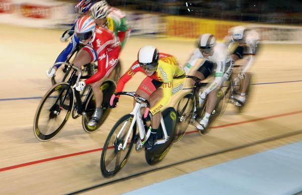 Simona Krupeckaite (Lithuania) holds off the challenge from Victoria Pendleton on the final bend to win the gold medal in the women's Keirin.