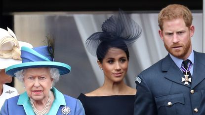 london, england july 10 queen elizabeth ii, prince harry, duke of sussex and meghan, duchess of sussex on the balcony of buckingham palace as the royal family attend events to mark the centenary of the raf on july 10, 2018 in london, england photo by chris jacksongetty images